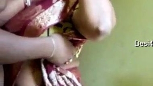 Guy undresses Indian desi and has sex with her on the bed