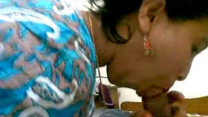 An Indian woman engages in passionate oral sex with her partner from the village