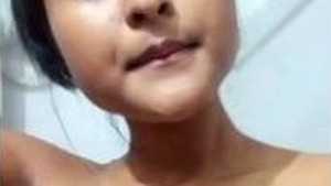 Naked teen with big boobs gets pleasure from masturbation