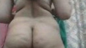 Indian beauty reveals her curvy figure including her large buttocks