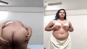 Watch a stunning girl flaunt her big butt in this steamy video