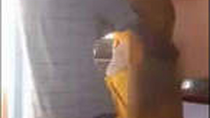 Caught on camera: A neighborhood boy gets naughty with his aunt in the kitchen