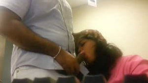 Young Indian woman performs oral sex and engages in intercourse in office setting