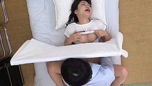 Asian woman gives a blowjob in a sensual video