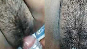 Man wears a sex condom and shoves XXX instrument into hairy pussy