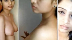 Indian girl displaying her big naturals prior to fucking