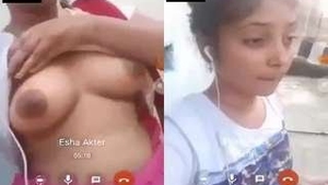 Indian girl teases with her breasts and masturbates on video call