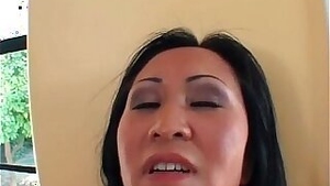 Asian MILF gets her wet pussy and fucked