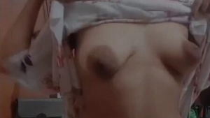 A captivating Indian woman with large breasts in a sensual video, featuring the bhabi tag