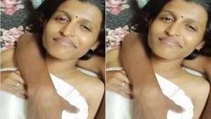 Tamil girl flaunts her breasts and pussy in a steamy video