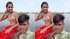 A couple enjoys a relaxing swim in the river