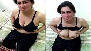 Indian wife flaunts her breasts in online video