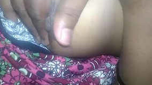 A husband fondles his wife's breasts before engaging in intense sexual activity