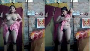 Desi girl dries off body with a towel, revealing erogenous zones on camera