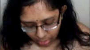 Indian wife gives a sensual blowjob in the bathroom