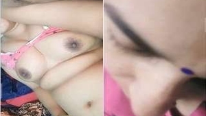 Husband flaunts wife's breasts during live sex show