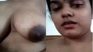 Budi's big boobs get a sensual massage in steamy video