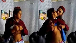 Sensual woman gives breastfeeding to the owner of the house