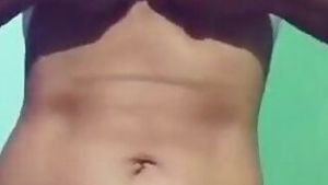 Porn video where aspiring Desi webcam model exposes tits and belly