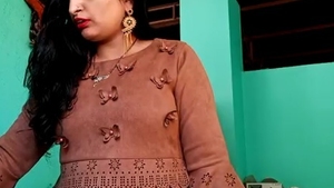 Watch a stunning Indian bhabhi flaunt her assets in a steamy video