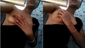 Adorable Indian girl flaunts her breasts in a seductive manner