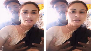 Indian bhabi's breasts on a pressing surface