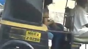 Indian couple kissing in public in auto