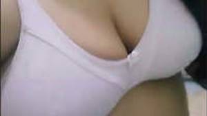 Mishal, a Pakistani girl, flaunts her ample bosom and curvy rear end in this video