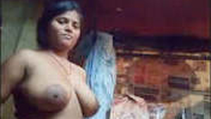 Boudi displays her large breasts