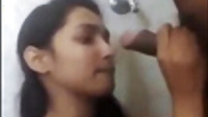 cute asian girl giving blowjob in bathroom to uncle