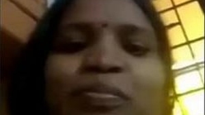Indian aunt displays her large breasts and vagina