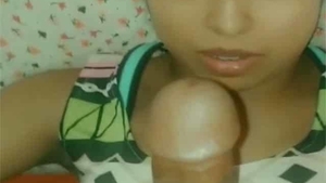 A seductive woman performs oral sex in a multi-person video