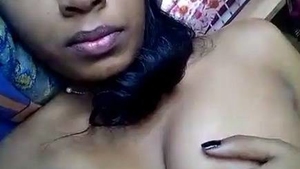 Indian woman indulges in nude selfie and boob fondling