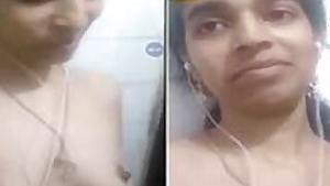 Indian babe naked XXX boobs and puts hand down there to rub clit